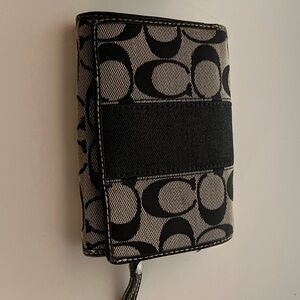 Coach Bi-fold monogram cotton & leather wallet